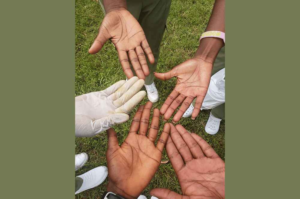 Corps members collaborating with local leaders